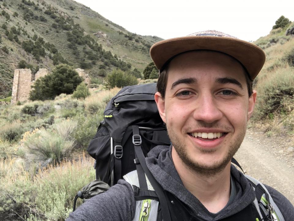 A selfie of Shaun on a hike